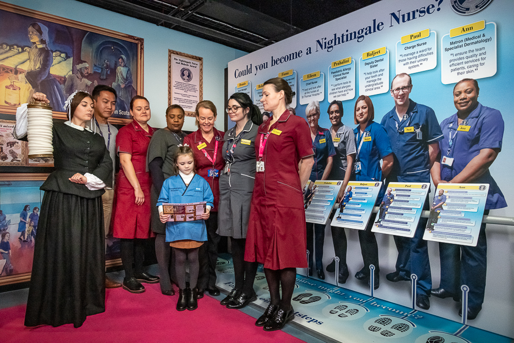 Group photo with Florence Nightingale performer and nurses visiting the Museum.