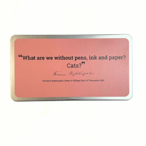 A closed metal tin with a pink sticker containing a Nightingale quote